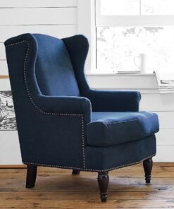 Upholstered chair with roll arms and loose cushions