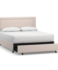 Platform bed with upholstered footboard and storage drawer
