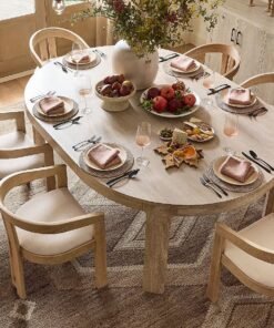 Dining table with round top and removable extension leaf