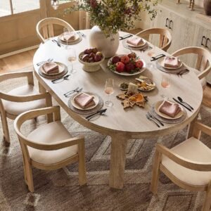 Dining table with round top and removable extension leaf