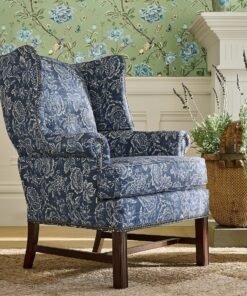 Upholstered chair with roll arms and loose seat cushion